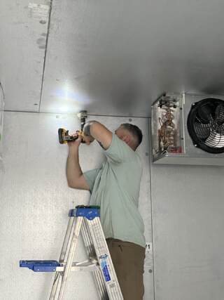 Drilling holes for commercial refrigerant lines