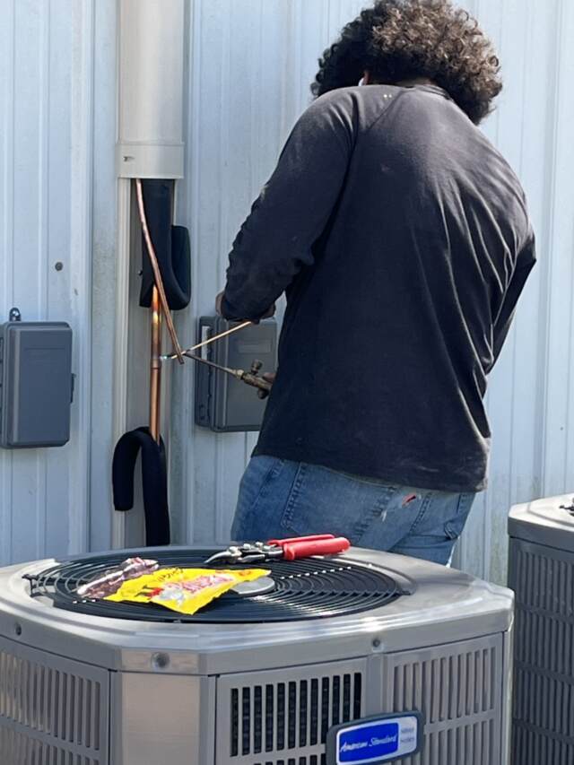 Welding some lines for the unit.