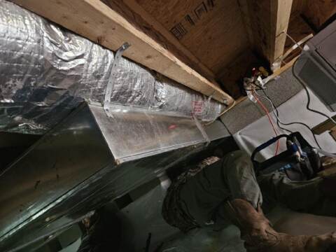 Here is a photo of how the duct work is secured to the structure using various fasteners.