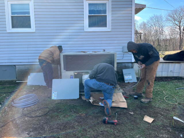 The team installed the new heat pump unit, ensuring proper mounting, securing, and leveling.