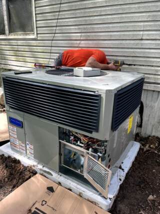 The new American Standard unit was set, and the team began hooking everything up!