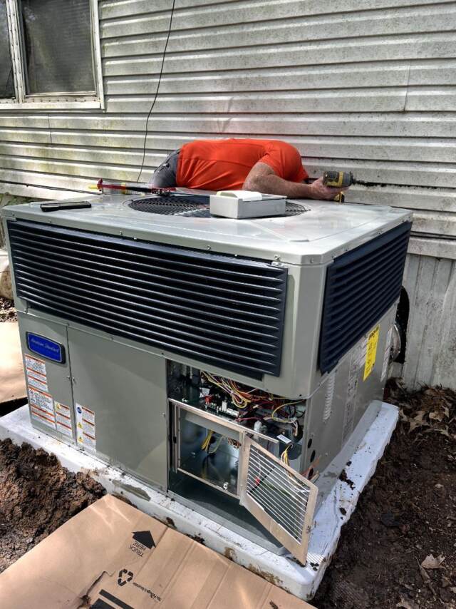 The new American Standard unit was set, and the team began hooking everything up!