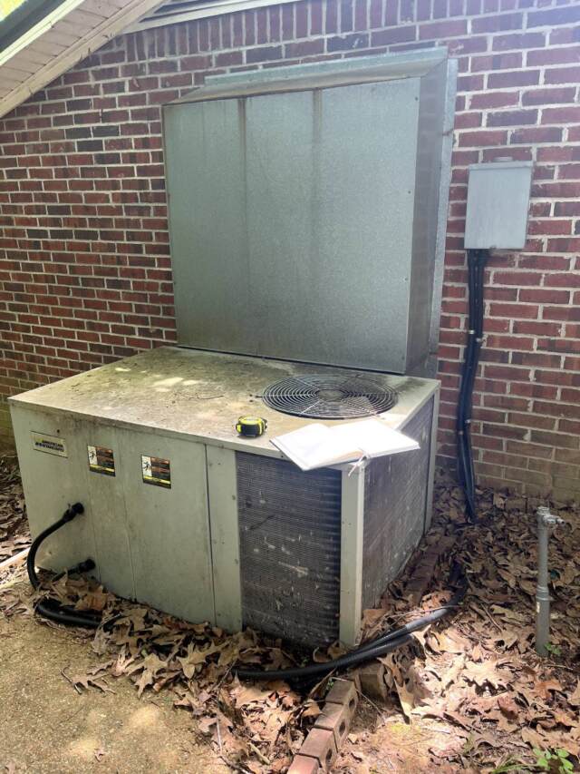 This is the old unit and duct work before replacement.